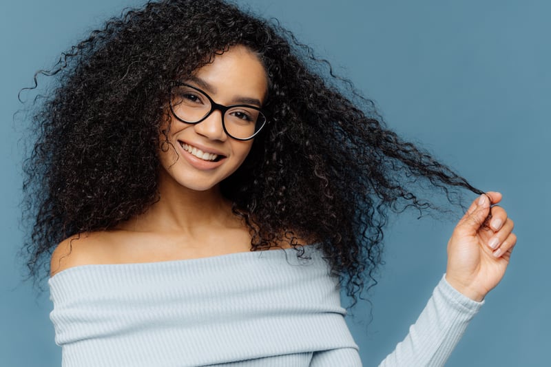 afro hair girl with glasses