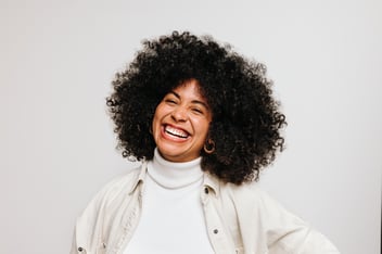 happy woman with afro hair